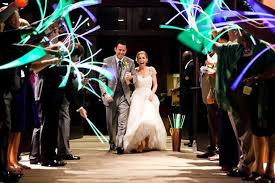 5 Unique Wedding Exits Weddingwire The Blog Glow Stick Wedding Wedding Exits Wedding Send Off