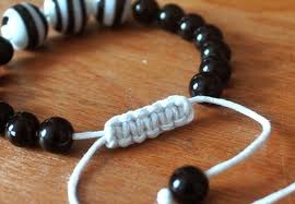 Starting with one end, lay the knotting cord over the other side of the cord. Sliding Macrame Closure For Bracelets How To Make A Bracelet Jewelry On Cut Out Keep