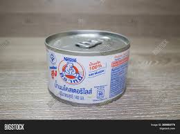 Bear brand powdered milk drink continues to strengthen generations of filipino families with the resistance building nutrients of iron, zinc and vitamin c. Bear Brand Can Milk Image Photo Free Trial Bigstock