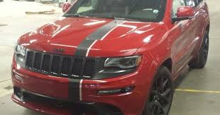 Black And Red Jeep Grand Cherokee Matte Black And Silver Single Racing Stripe Installed On A Red Jeep Cherokee Jimriehl Sfriendlychryslerjeep Red Jeep Racing Stripes Willys Jeep