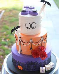 20 Spooktacular Halloween Themed Baby Shower Ideas Cafemom Halloween Baby Shower Theme Halloween Baby Shower Baby Shower Cakes Girl
