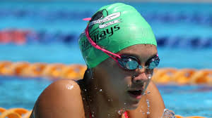 A Cairns teenage swimmer has smashed a record older than her out of the  water