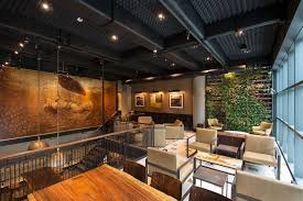 Order a tall coffee in a grande cup. Sirens And Clovers Behind The Design At Starbucks First Store In Colombia