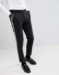 Pairing your black and gold suit with a black color shirt and gold color tie gives a fantastic look. Asos Design Skinny Tuxedo Suit Pants In Black With Gold Honeycomb Effect Side Stripe Black Dress Pants Men Black Pants Men Tuxedo Stripe Pants