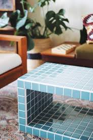 Add some molding around the edges and then lay out the tile on the table. Diy Blue Tile Table Thats Trending On Tok Tok And Instagram Tile Tables Diy Tile Tile Furniture