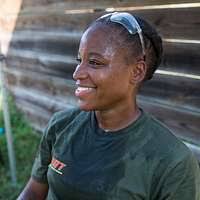 U.S. Marine Sgt. Lashawna Wilson demonstrates v-ups