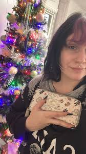A Farmington Hills couple is calling it their own Christmas miracle after a  kind stranger drove from downtown Detroit to return a lost wallet right to  their doorstep after the Christmas tree