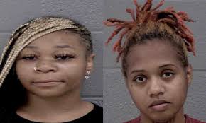 TWO WOMEN CHARGED WITH ROBBING CONVENIENCE STORE Demani Love, 22, (Left)  and Skiasia Banner, 22, (Right) are charged with robbing a convenience  store at 4200 Glenwood Drive Charlotte, NC. On August 4,