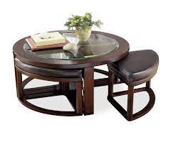 Includes coffee table and (4) four stools with storage. Marion Round Coffee Table With 4 Stools Hom Furniture