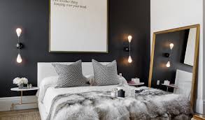 Which wall should be an accent wall in a bedroom? These Dark Accent Walls Break All The Small Space Design Rules