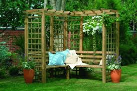 The Perfect Little Garden Haven Garden Benches To Enhance Your Outdoor Space Lattice Garden Garden Seating Pergola Designs