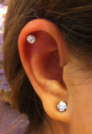 just got this piercing at claire s crystal fireball piercings orelha feminino piercings piercings na orelha