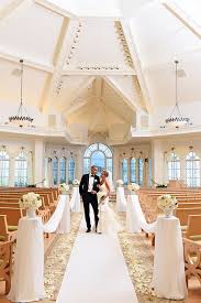 Sophisticated And Classic Ceremony Decor At Disney S Wedding Pavilion Disney World Wedding Disney Wedding Disney Fairy Tale Weddings