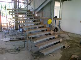 Constructed from a steel skeleton which is concealed by wall finishes and staircase components. A Modern Cantilever Staircase In Steel And Wood Eugene T Mangubat Associates