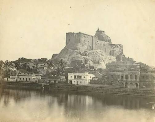 The Rock at Trichinopoly painting with barracks and temple procession