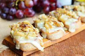 President S Cheese Crostini Wtih Brie Caramelized Onion Pear And Pine Nuts 2 From Willcookforsmiles Com C Caramelized Onions Nut Free Recipes Pine Nut Recipes