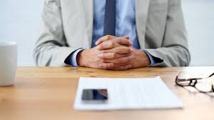 He looks like he's up to something. 27 Most Common Job Interview Questions And Answers Inc Com