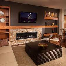 Browse Photos Of Basement Rec Room Find Ideas And Inspiration For Basement Rec Room To Add To Built In Electric Fireplace Fireplace Design Basement Fireplace