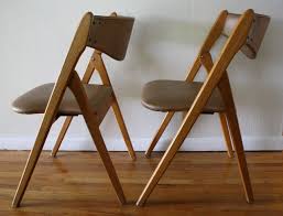 Germain folding chair only 13 inches wide, so great for squeezing in guests. Modern Folding Chairs Ideas On Foter