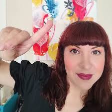 Iggy Pop with his cat Nikki.