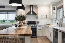 Marvelous kitchen designed with biscotti color cabinets and black pearl granite countertops. 10 Most Elegant White Cabinets And Black Appliances For Your Kitchen Ideas La Urbana