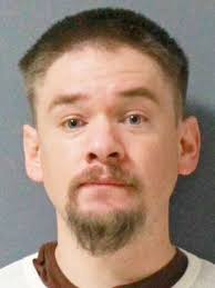 Order violations lead to drug possession charge, fugitive waives  extradition