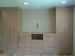 Custom bedroom closet from closet world are a great way to keep your room organized. Bedroom Wall Unit With Space For A 60 Tv Extra Hanging Space And Drawers Crown Molding To Bedroom Wall Units Bedroom Cupboard Designs Bedroom Closet Design