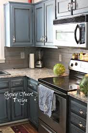 Wood Plank Backsplash Blue Distressed Cabinets Kitchen Kitchen Design Kitchen Remodel Kitchen Renovation