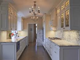 Smart Ways To Redo Or Shop For Cabinets Without Breaking The Bank Galley Kitchen Design Budget Kitchen Remodel Kitchen Remodel Cost