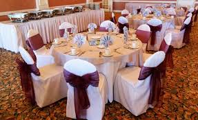 black and ivory chair covers available for rent with wine burgundy organza bows in manhattan beach chair covers wedding chair cover rentals white chair covers