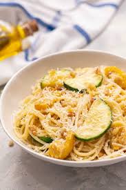 Toss together the tomatoes, 1/4 cup olive oil, salt, and pepper. Summer Squash Lemon Spaghetti The Recipe Critic