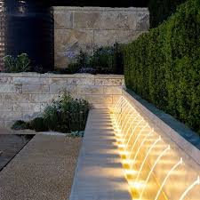 Beautiful Way Of Using Garden Lighting By Thomas Hoblyn Landscape And Garden Design House Water Features In The Garden Landscape Design Outdoor Landscaping