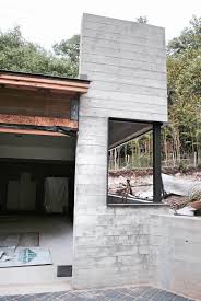 Building a retaining wall on a sloping property can have several benefits for property owners, as follows: Finding Beauty In Board Formed Concrete Walls