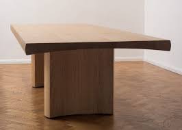 A Minimalist Slab Legged Oak Dining Table Inspired By Japanese Joinery Ha Wooden Dining Tables Contemporary Modern Furniture Contemporary Modern Dining Table