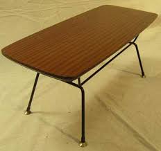 Midcentury coffee table with turning top board in formica and wood 1960s design market. Formica Coffee Table 059 Wood Grain H38cm W88cm D38cm First Scene Nz S Largest Prop Costume Hire Company
