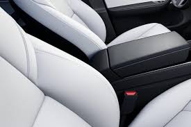 Tesla unveiled it in march 2019, started production at its fremont plant in january 2020 and started deliveries on march 13, 2020. 2021 Tesla Model Y Review New Tesla Model Y Suv Price Performance Range Interior Features Exterior Design And Specifications Carbuzz