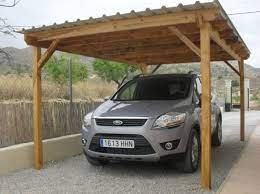 If you learn how to build a carport you'll be a better handyman! Diy Carport Ideas Carport Design Diy Carport Pergola Carport Carport Designs
