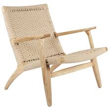 The Sungar Arm Chair Is Made From Solid Ash Wood With Hand Made Paper Cord Rattan In A Natural Or Walnut Color Oil Ch25 Lounge Chair Ch25 Easy Chair Furniture