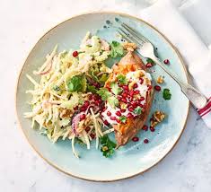 Sweet Potato Jackets With Pomegranate Celeriac Slaw Recipe Cooking Sweet Potatoes Bbc Good Food Recipes Sweet Potato Jacket