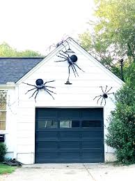 Start with halloween wreaths for the doors. Outdoor Halloween Decorations Spooky Kid Friendly Spiders Iron Twine