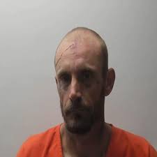 No, his lights weren't on, and, yes, he had drugs in the car