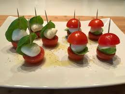Selection of house marinated olives. Pomodorini Mozzarelline Ciliegino Con Basilico Un Antipasto Squisito