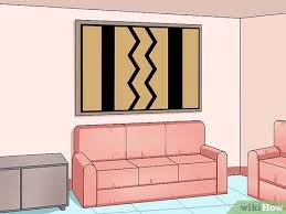Einen teppich an die wand zu hängen, hört sich für viele im ersten augenblick erstmal komisch an, ist aber ein gutes designelement für die wohnung. Einen Wandteppich Aufhangen Wikihow