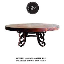 The beautiful copper top of the table can also be used as a work of art on the wall. New World Coffee Table Hammered Copper Top Wrought Iron Mexports Inc Mexports Inc By Susana Molina