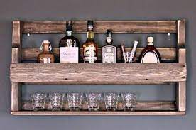 Will hold various size bottles, everything from wine to full handles. Whiskey Shelf Wine Shelf Wine Whiskey Glass Shelf Glasses Holder Bottles Shelf Wooden Brown Ready Assembled Whisky Wine Shelves Glass Holders