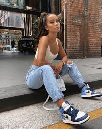 White Crop Top With Blue Mom Jeans Paired With Nike Jordan Retro 1s Croptop Outfits Fas In 2020 Streetwear Fashion Women Fashion Inspo Outfits Jordan Outfits Womens