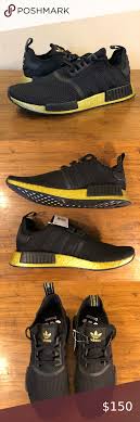 Adidas Nmd R1 Black And Gold Adidas Nmd R1 Stlt Primeknit Black Gold Sneakers In 2020 Black And Gold Sneakers Black And Gold Shoes Adidas Nmd R1