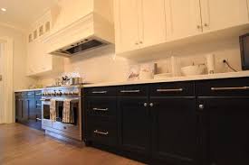 Another great look is to paint the top cabinets a traditional white and the bottom cabinets a sunny yellow. Kitchen Cabinets White Top Dark Bottom Etexlasto Kitchen Ideas