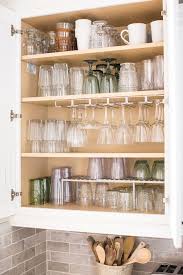 How To Organize Your Glassware Cabinet Once And For All Kitchen Organization Diy Small Kitchen Organization Diy Kitchen