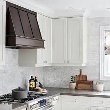 One thing we noticed was the vents in the toe kick just open underneath the cabinet and there is no duct work from the register in the floor under the cabinet to the front of the toe kick. Under Cabinet Vent Hood Design Ideas